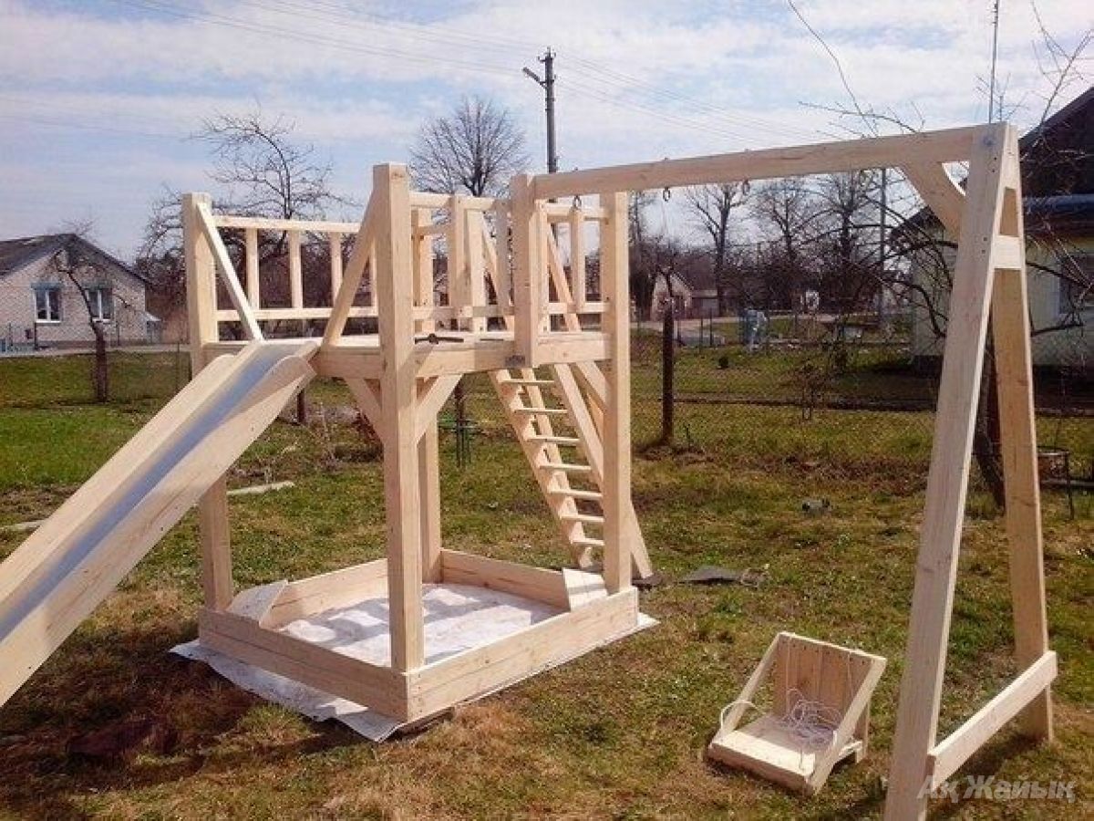 Детская качели из дерева Детская качели из дерева